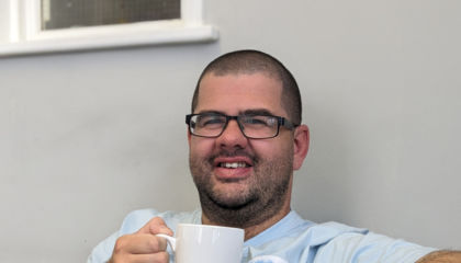 Lee with a cup of tea