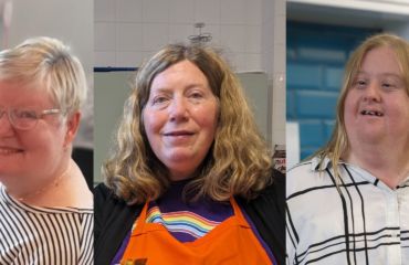 Three women smiling to camera