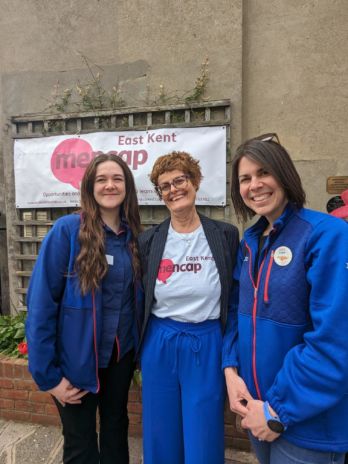 Two ladies from Tesco Manston and East Kent Mencap Fundraising Manager in Ramsgate Hub garden