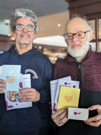 Stephen and Patrick holding up their fundraising kits