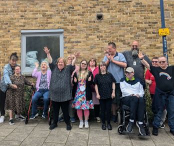 Natalie and her East Kent Mencap friends smiling