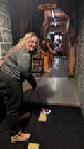 A member with a learning disability playing adventure golf in Maidstone.