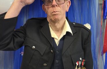 A member with a learning disability at Ramsgate Hub, taking part in VE Day remembrance.