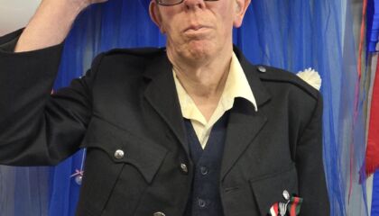A member with a learning disability at Ramsgate Hub, taking part in VE Day remembrance.